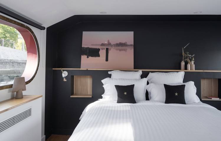 Photo of Bed and Bicycle ( La Péniche )